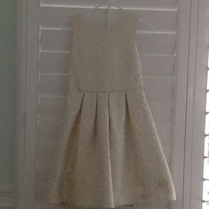 This is a gold and white dress for Nordstrums!
